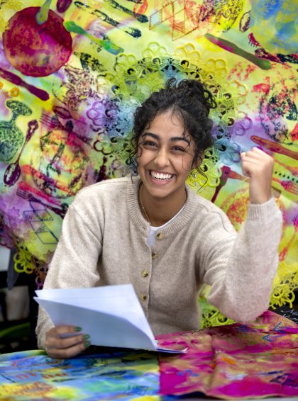 AI5I7514 Isaac smiling holding his gold medal