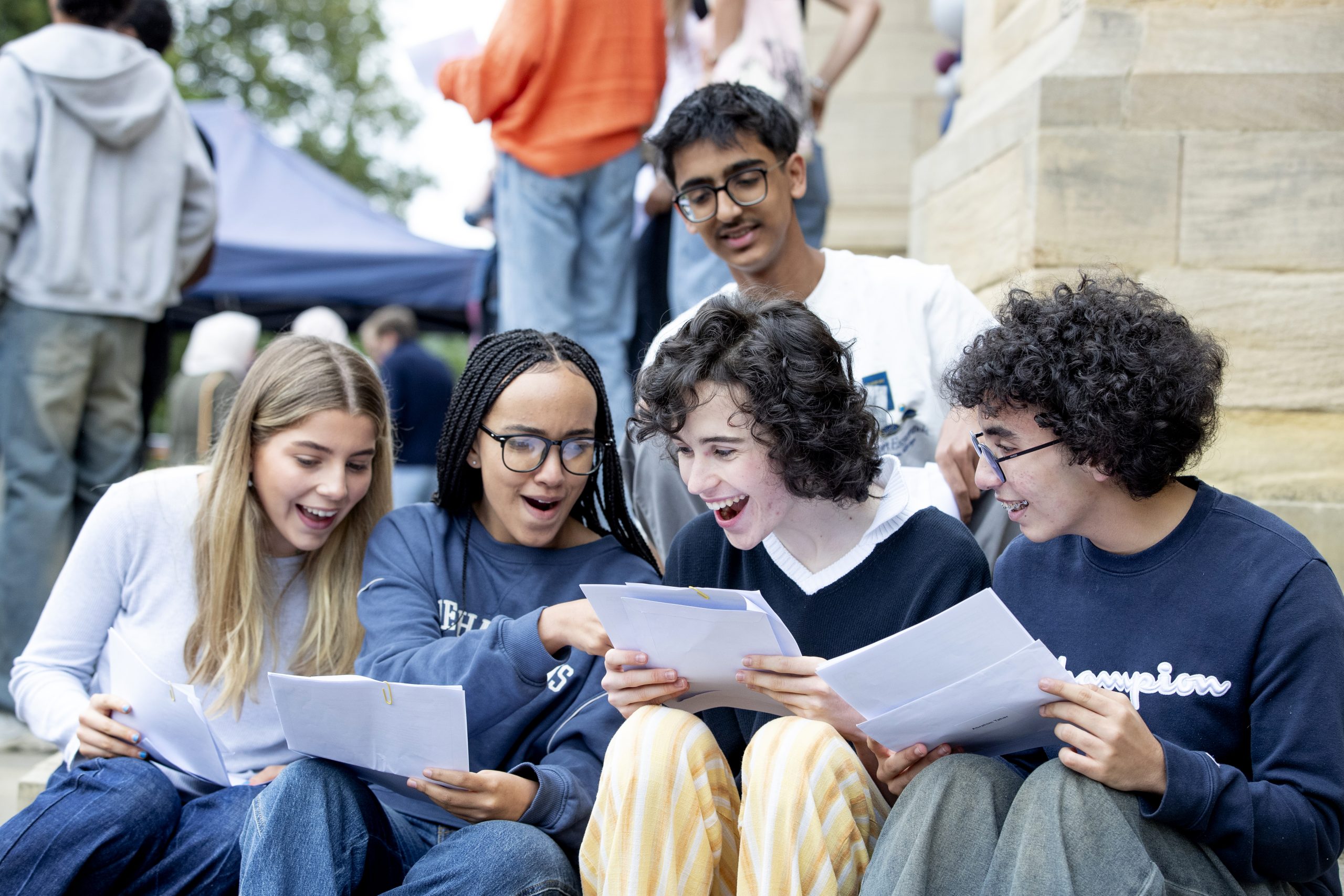 All 5 Straight 9's students celebrating together with their results.