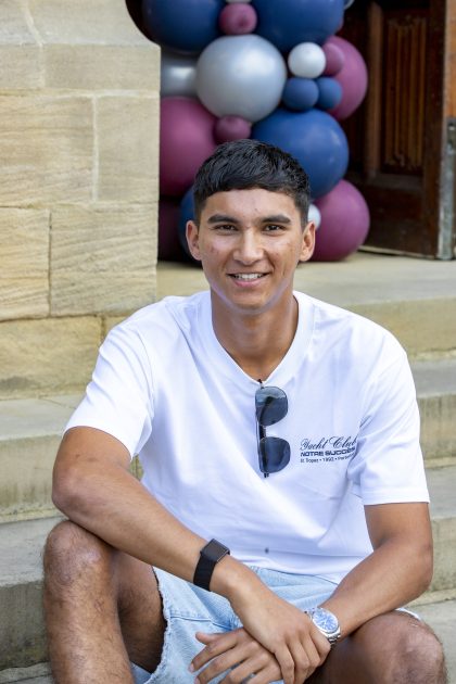 BRADFORD GS – YORKSHIRe AND ENGLAND CRICKET PLAYER ALEX WADE_4 Isaac smiling holding his gold medal