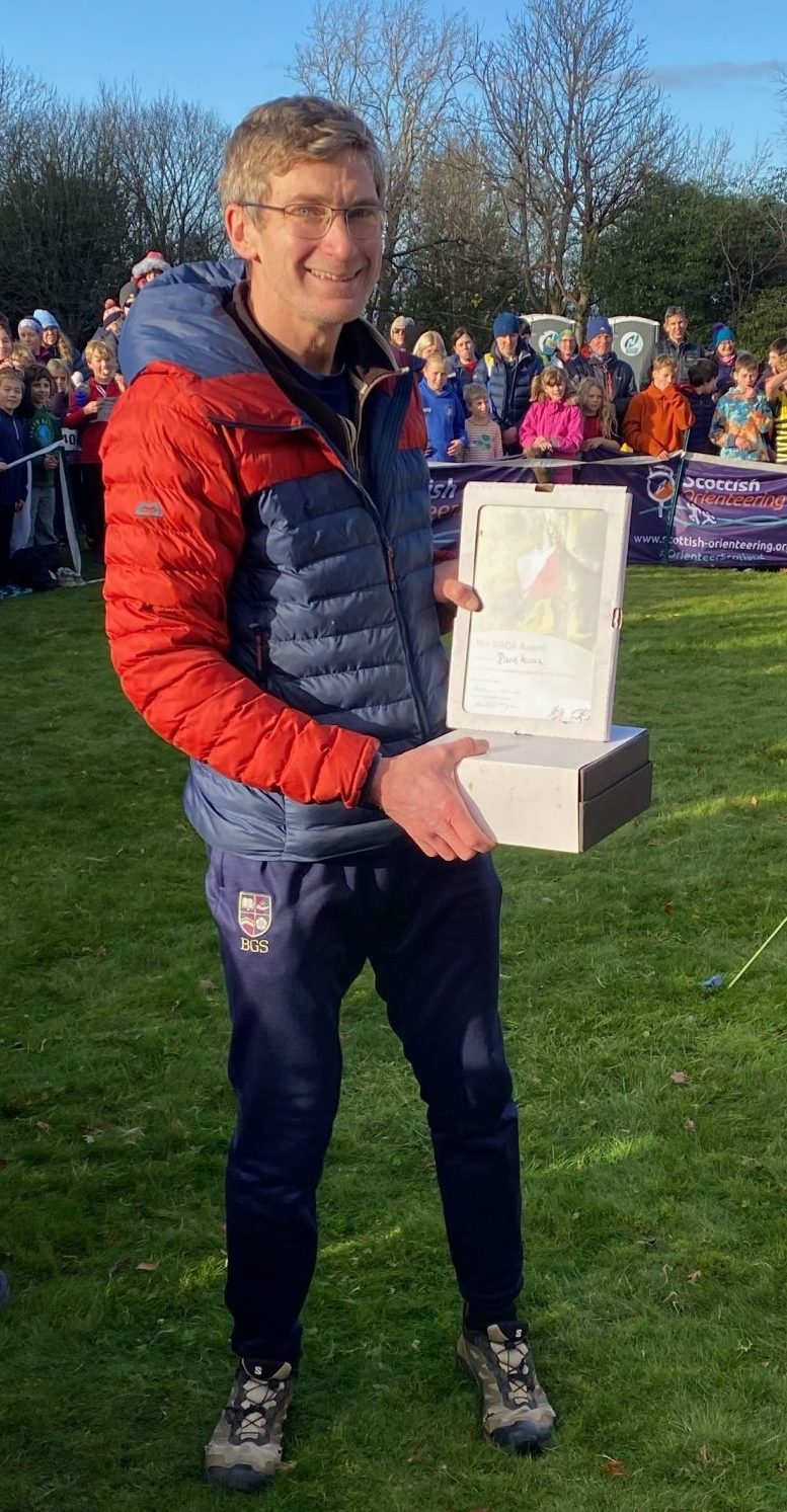 David Alcock receiving his award.
