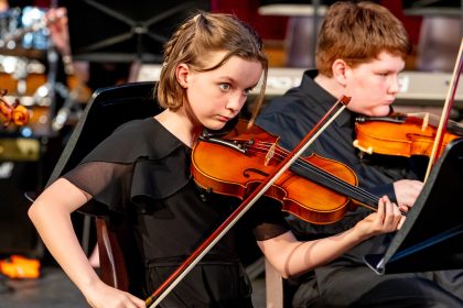 Music Scholarships Music scholarship pupil performing at Bradford Grammar School